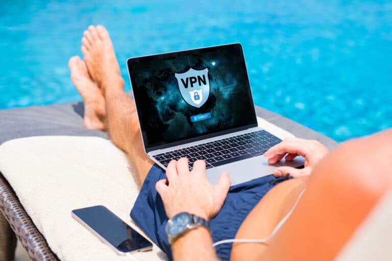 Man using VPN by the swimming pool